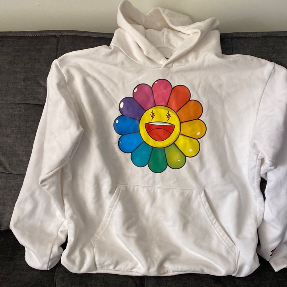 J Balvin white hoodie and plush artwork